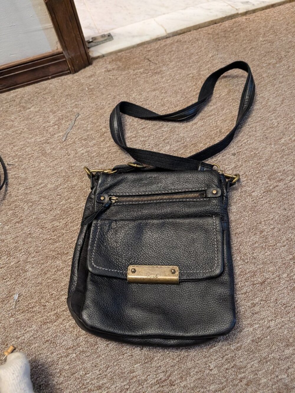 The Sak Ventura Flap Organizer Black Leather Crossbody Bag